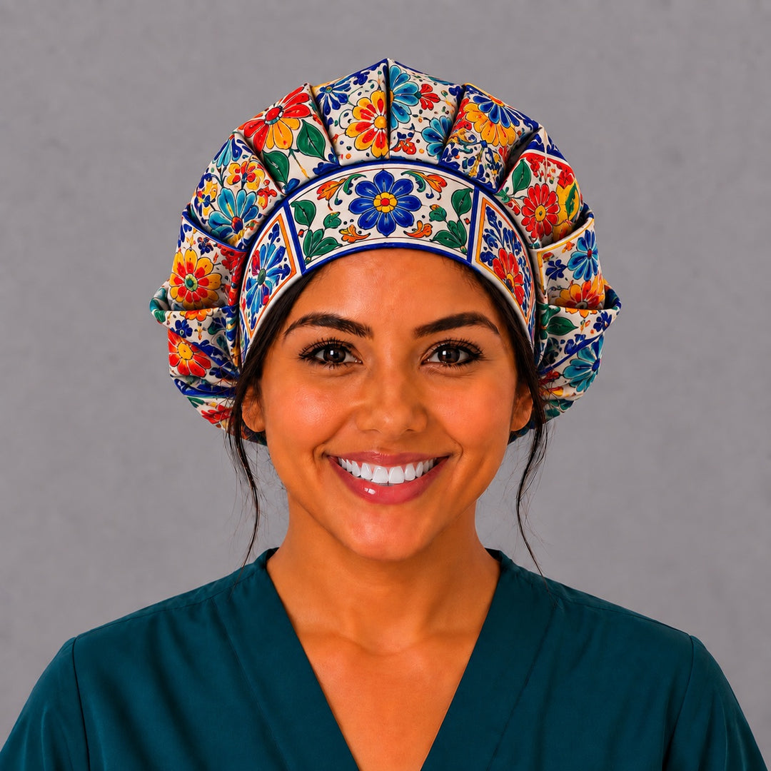 Front view of a Mexican Talavera pottery surgical hat with a cobalt tile band framing the face, handmade by OR World