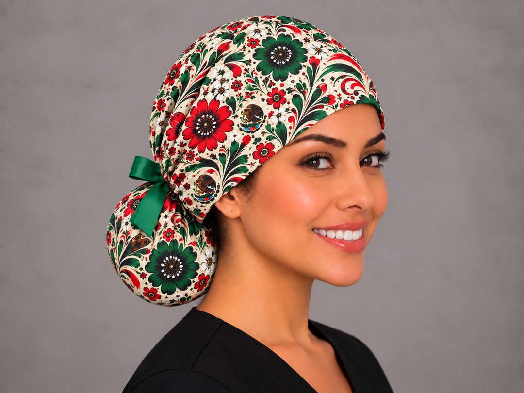 Mexico eagle floral scrub cap, right three-quarter view, ponytail pouch tied with green grosgrain bow, handmade in USA