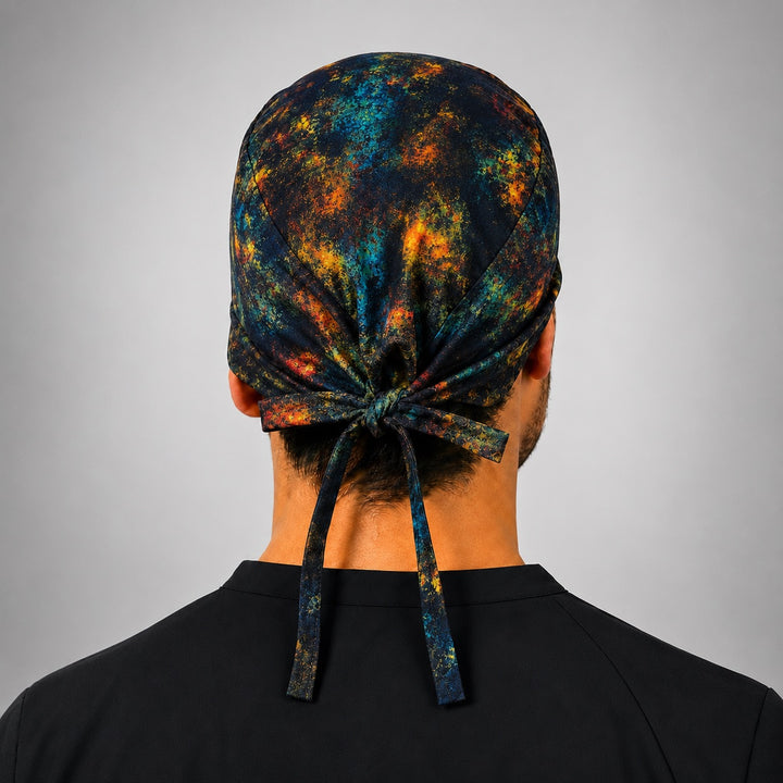 Back view of adjustable tie-back knot on rustic midnight galaxy cosmic nebula scrub cap surgical hat for men