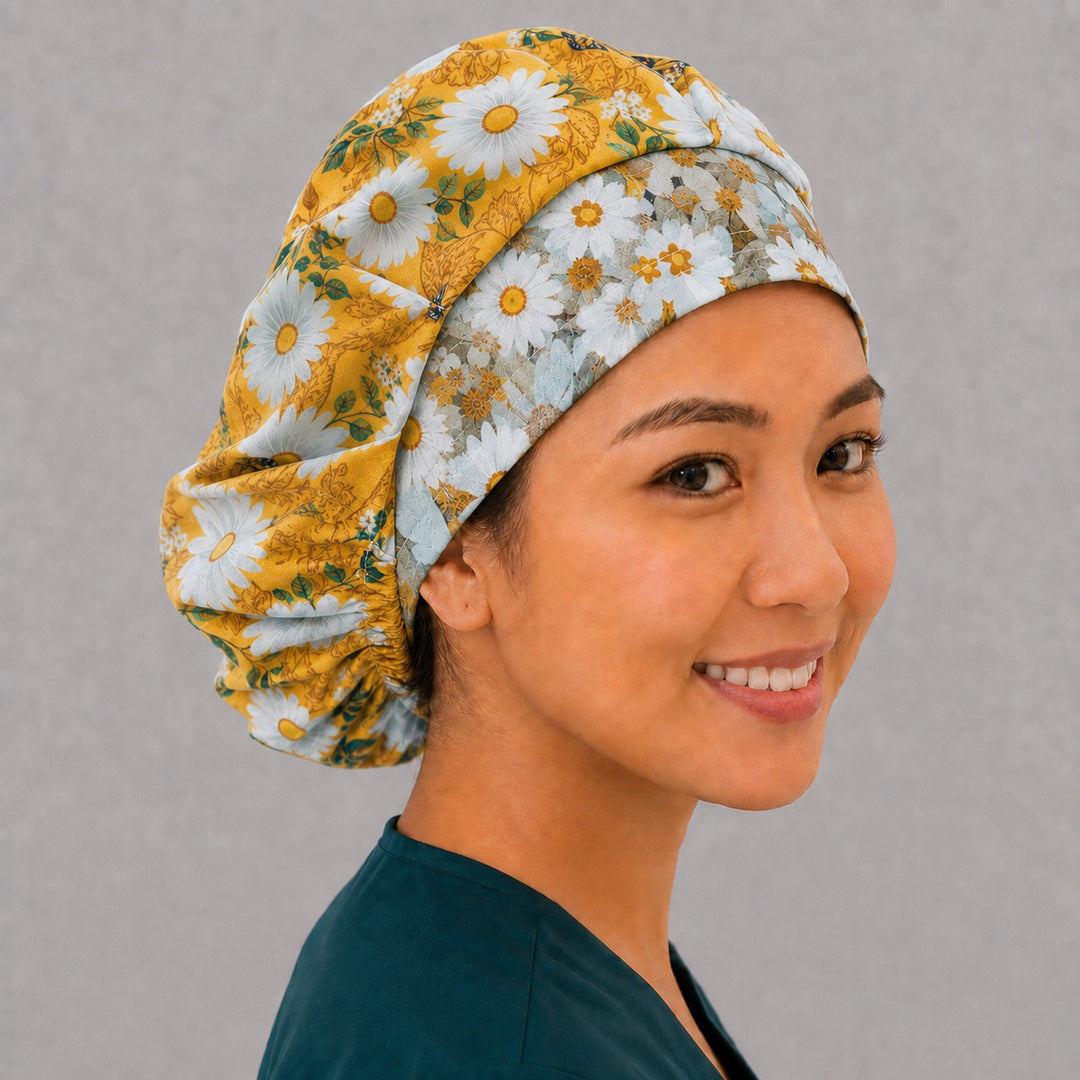 Monarch and daisy bouffant surgical cap for long hair, side view — golden floral print with deep gathered fit for OR and L&amp;D nurses