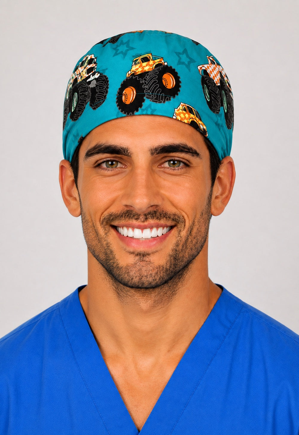 Left profile of monster truck and star scrub cap in teal, handmade peds OR cap for men