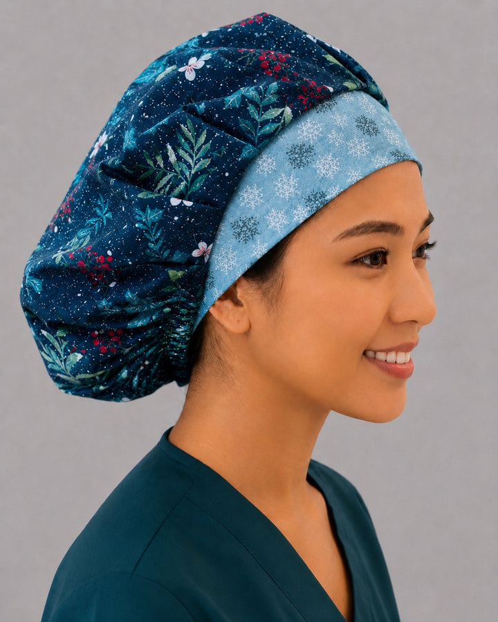 Side view of the navy holly berry bouffant surgical hat — glittering winter foliage print with snowflake band, roomy breathable cotton cap