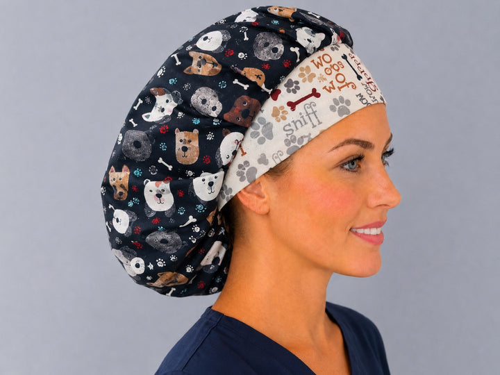 Side view of the navy puppy face bouffant surgical cap — dogs, bones and paw prints with Woof and Sniff band, roomy cotton cap for nurses