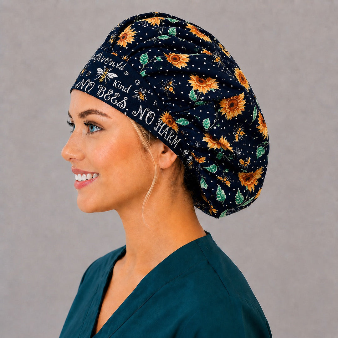 Black sunflower and bee bouffant scrub cap, left side profile — roomy elastic-back cap that secures long thick hair for OR and L&amp;D nurses