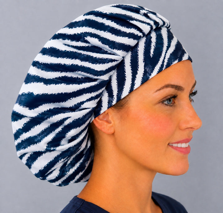 Right side profile of the zebra stripe bouffant surgical hat — high-contrast animal print, roomy breathable cotton cap for nurses