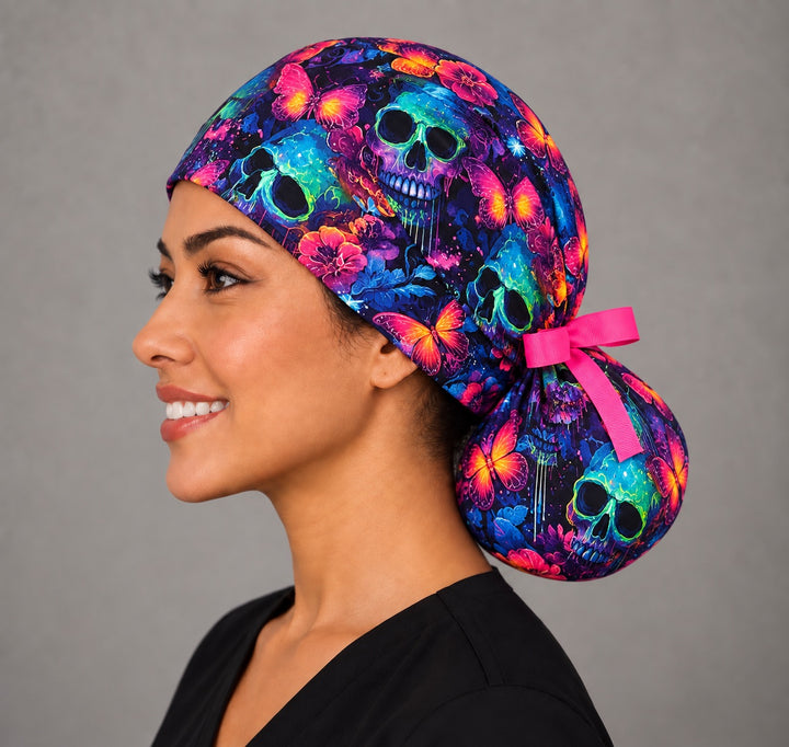 Left profile of the neon butterfly ponytail cap showing the roomy pouch for long, thick or curly hair