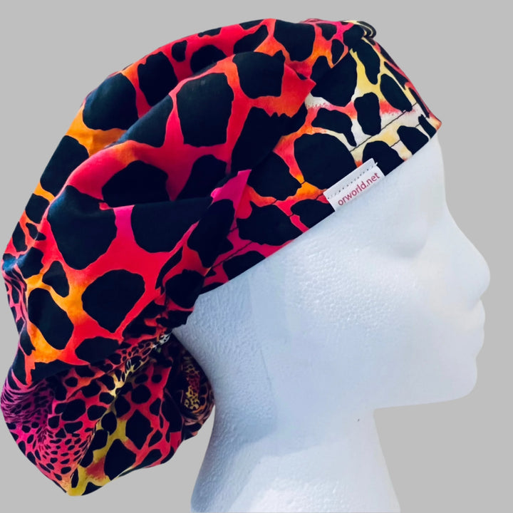 Neon cheetah print bouffant scrub cap in pink, orange &amp; yellow animal print, front view — handmade-in-USA surgical hat for women from OR World.