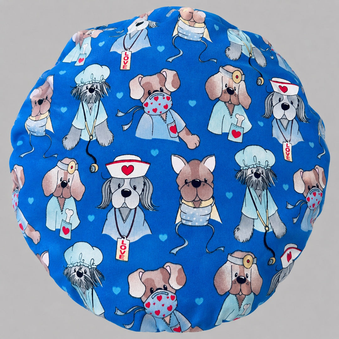 Nurse dog print bouffant scrub cap for women, front view, puppies dressed as nurses and doctors on blue, handmade surgical hat by OR World