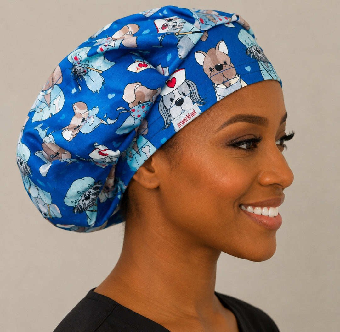 Nurse dog print bouffant scrub cap left side profile showing puppies dressed as nurses and surgeons on blue, women&