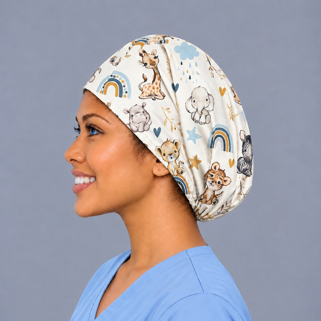 Left side profile of an OB nurse euro cap in 100% cotton, showing the deep crown with room for long hair and a baby zebra and cheetah at the back