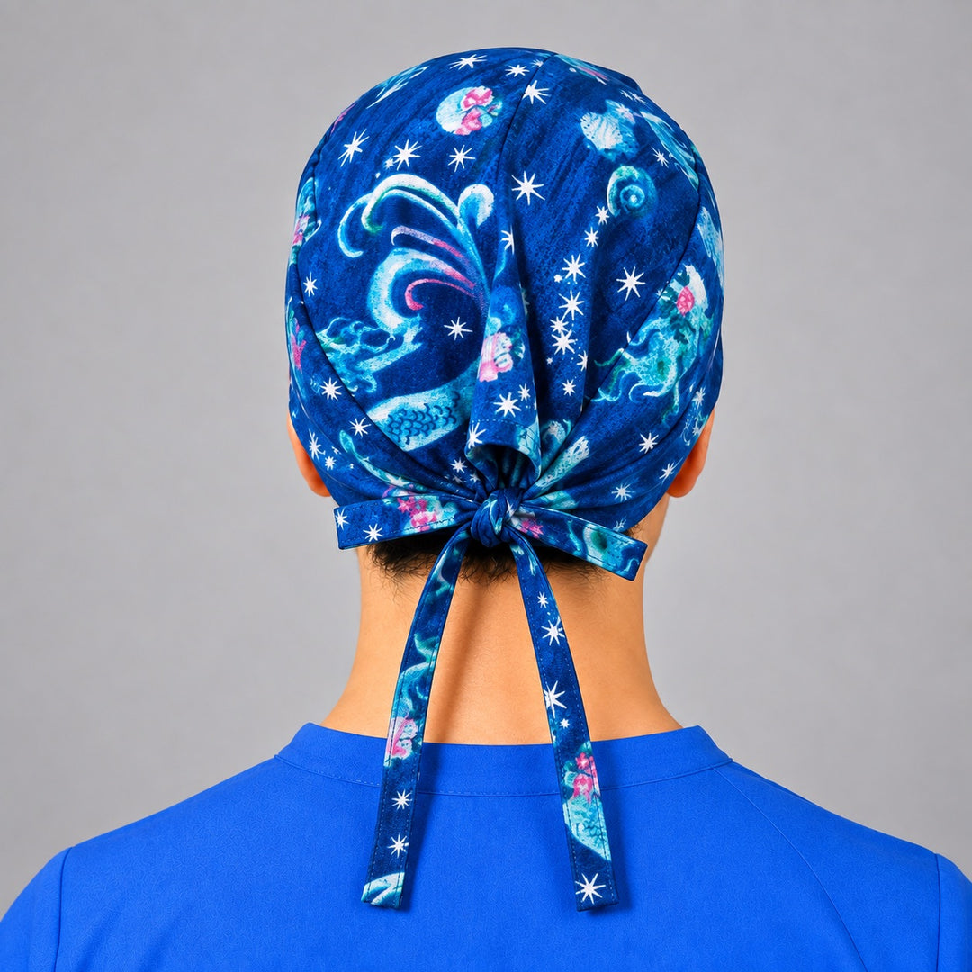 Rear bow ties on ocean night star scrub hat, adjustable unisex closure shown from behind