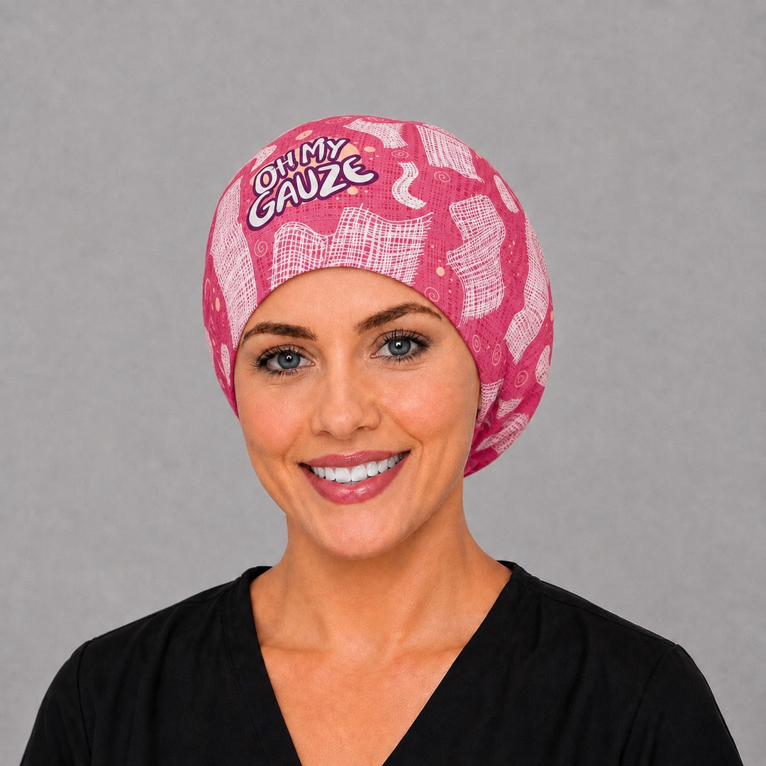 Woman wearing an Oh My Gauze Euro scrub cap, front view — funny gauze print on raspberry pink, adjustable Euro-style surgical hat