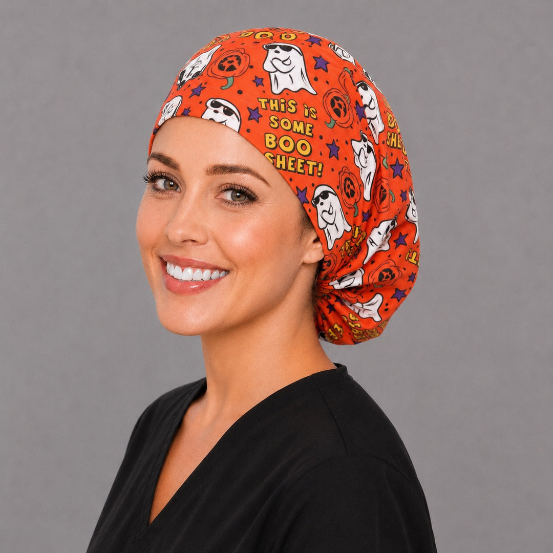 Orange Halloween ghost Euro surgical cap, right angled view — elastic adjustable back with full head coverage for long hair