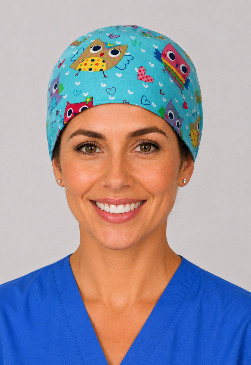 Back view of adjustable tie-back knot on teal colorful owl unisex surgical hat