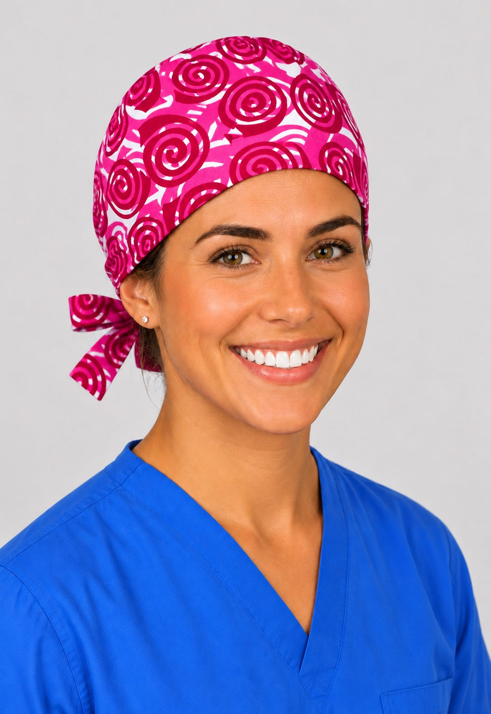 Painted swirl Valentine surgical hat in straight front view, pink cap sized for short hair