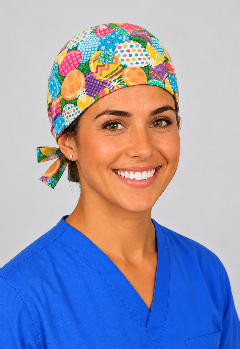 Pastel Easter egg scrub cap in left angled view, spring gift for pediatric nurses and techs
