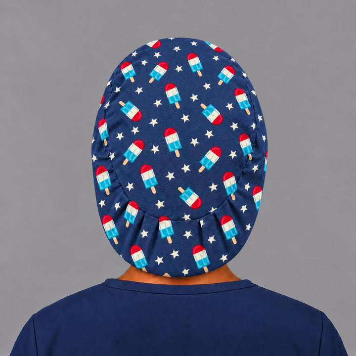 Back view of the Patriotic Popsicle Euro scrub cap — elastic gathered back showing popsicles and stars across the navy crown