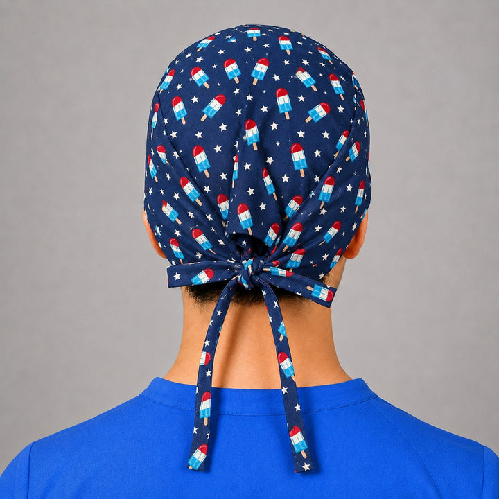 Back view of adjustable tie-back knot on navy patriotic popsicle unisex surgical hat