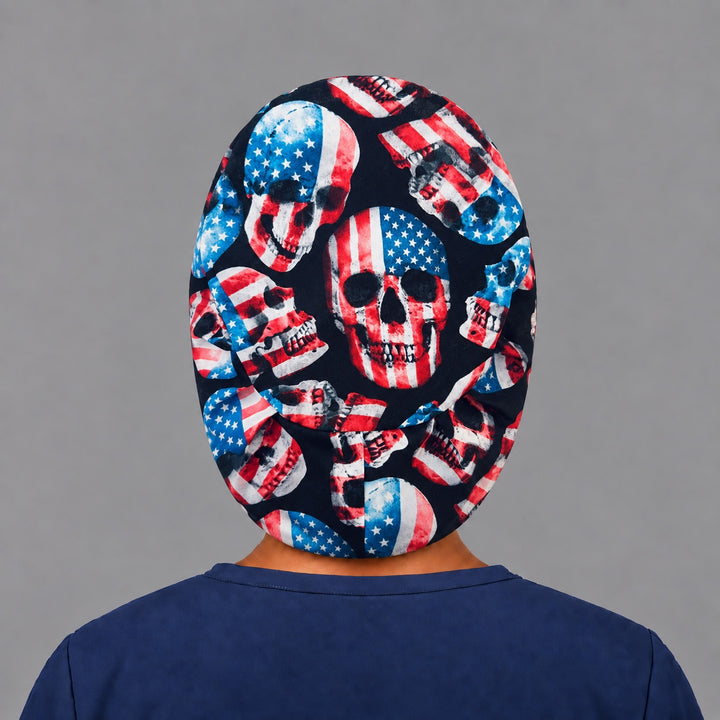 Back view of the patriotic skull Euro scrub cap — elastic gathered back showing flag skulls across the black crown