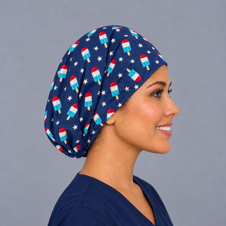 Patriotic star popsicle Euro scrub cap, right angled smiling view — summer popsicle print for OR nurses and surgical techs