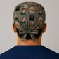 Back view of forest-green personalized photo tie-back scrub cap with bow tie and uploaded photos — custom photo surgical hat, gift for surgeons & nurses, handmade-in-USA OR World.