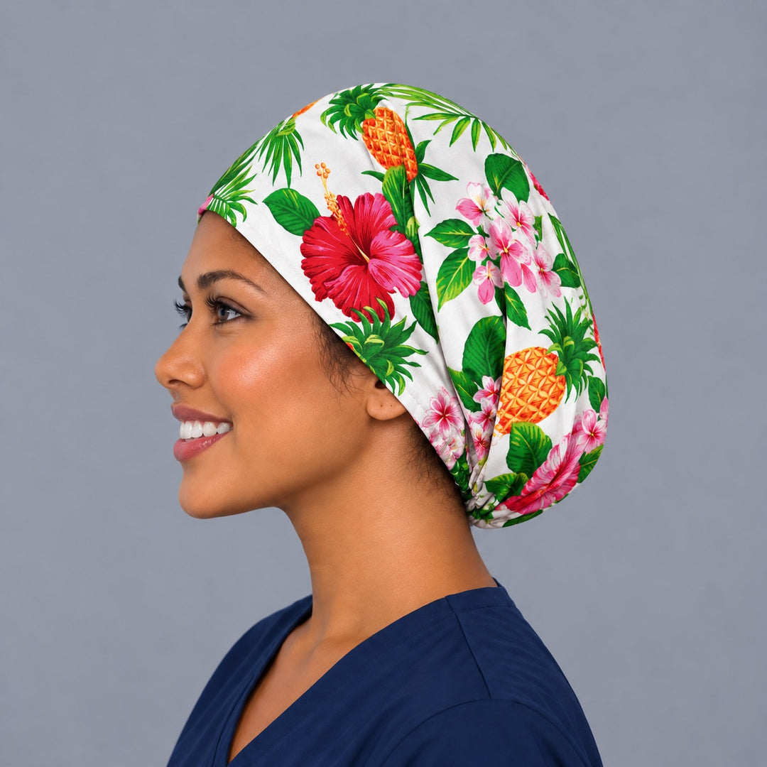 Pineapple and plumeria Euro cap, left side profile — handmade white tropical floral surgical cap, USA made