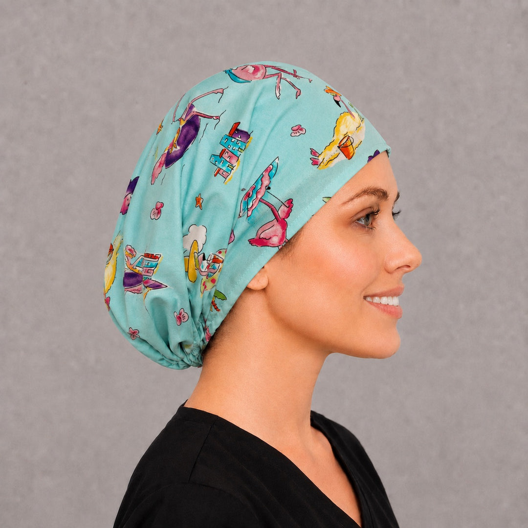 Left side profile of the pink flamingo Euro surgical hat — tropical beach print with pool floats, breathable cotton cap for OR nurses