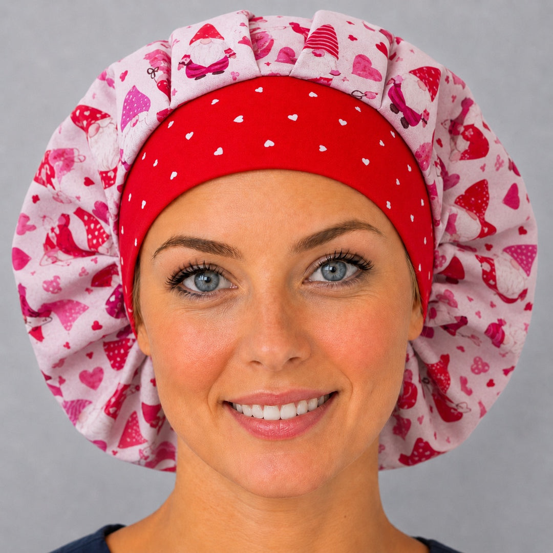 Side view of the pink gnome Valentine bouffant surgical hat — blush gnome print with red heart contrast band, roomy breathable cotton cap
