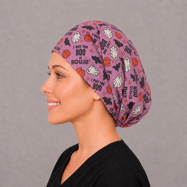 Pink Halloween Euro surgical cap, right side profile — elastic adjustable back with full head coverage for long hair