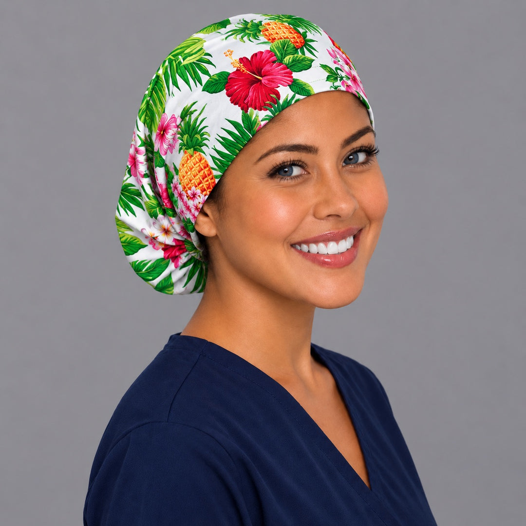 Pink hibiscus Euro scrub cap, right angled smiling view — fuchsia bloom print for OR nurses and surgical techs