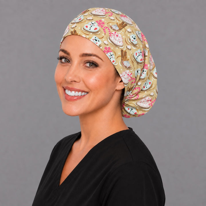 Pink peppermint Euro scrub cap, right angled smiling view — whipped cream and snowflake print for OR nurses and surgical techs