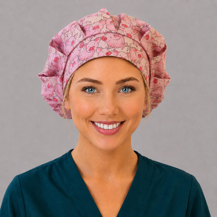 Woman wearing a pink pig bouffant scrub cap, front view — cheerful farm piglets on blush pink, adjustable women&