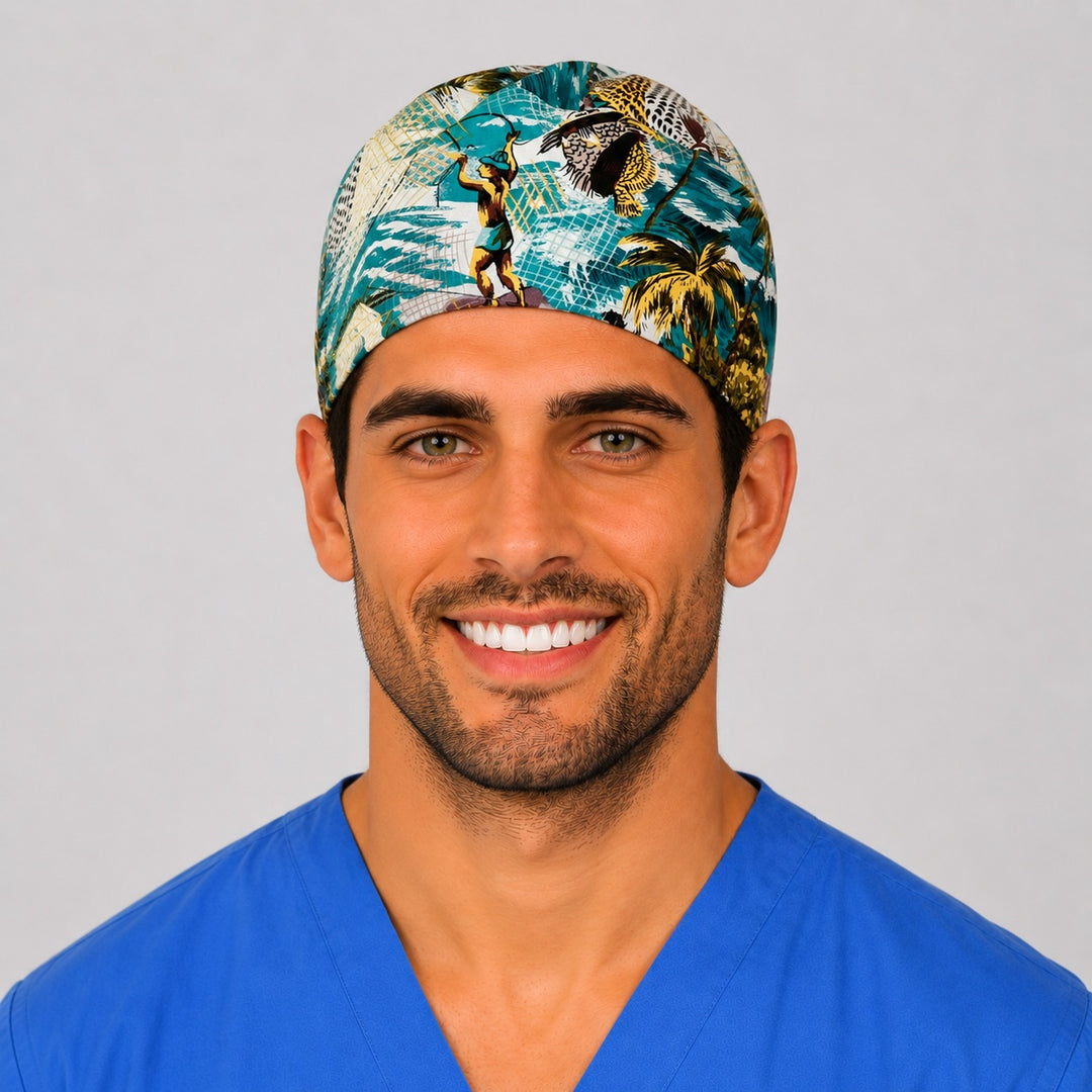 Man wearing a Polynesian fishing tie-back scrub cap with a tropical fisherman, net and palm print in teal and gold, front view — OR World surgical hat