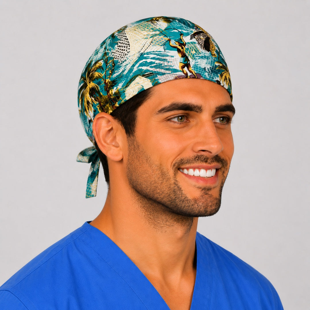 Polynesian tropical fishing scrub cap on a smiling male nurse, front three-quarter angle showing the tie-back