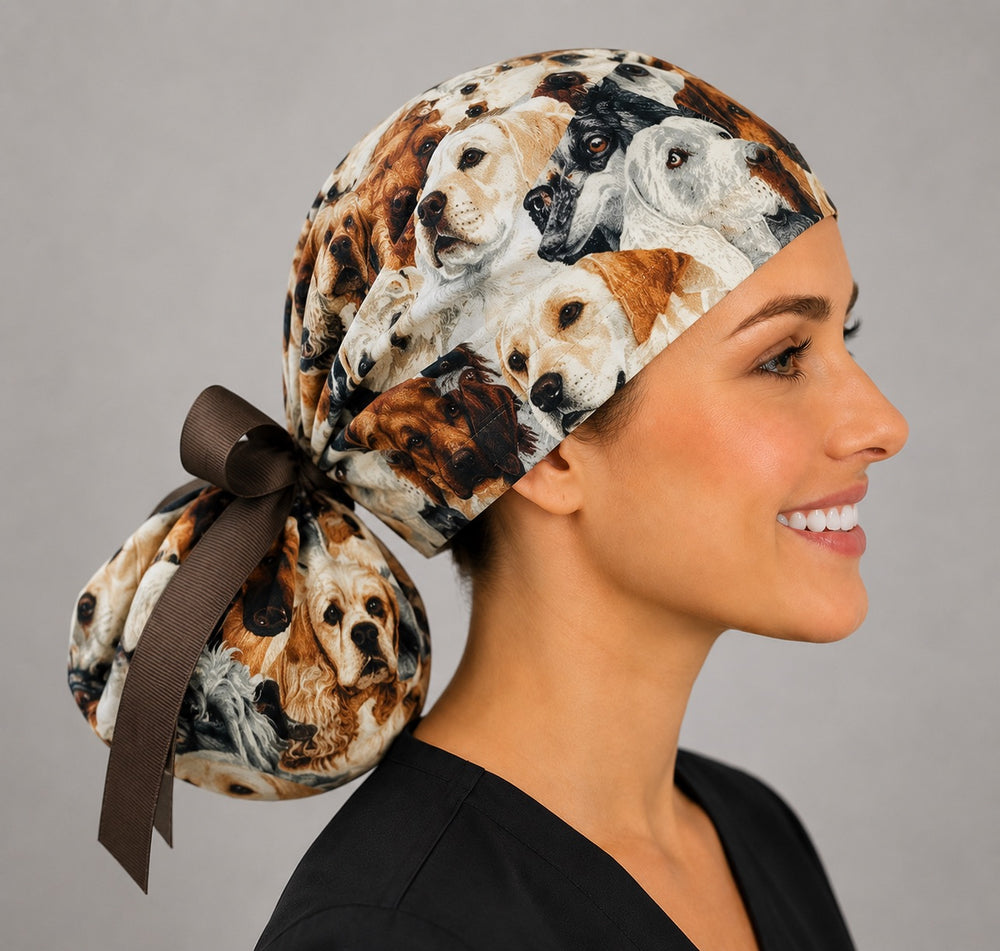 Dog lover ponytail surgical cap right side profile showing gathered ponytail pouch full of dog breeds and brown grosgrain bow