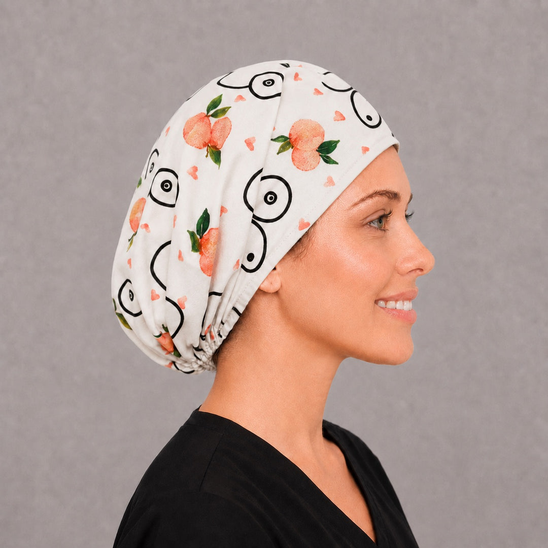 Pretty in Plastics Euro scrub cap, right angled smiling view — cosmetic and breast surgery print for surgeons and surgical techs
