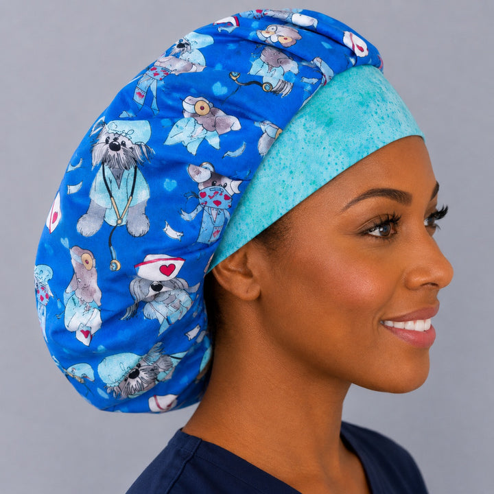 Side view of the puppy nurse bouffant surgical hat — dogs with stethoscopes and nurse caps, aqua-green contrast band, roomy cotton cap