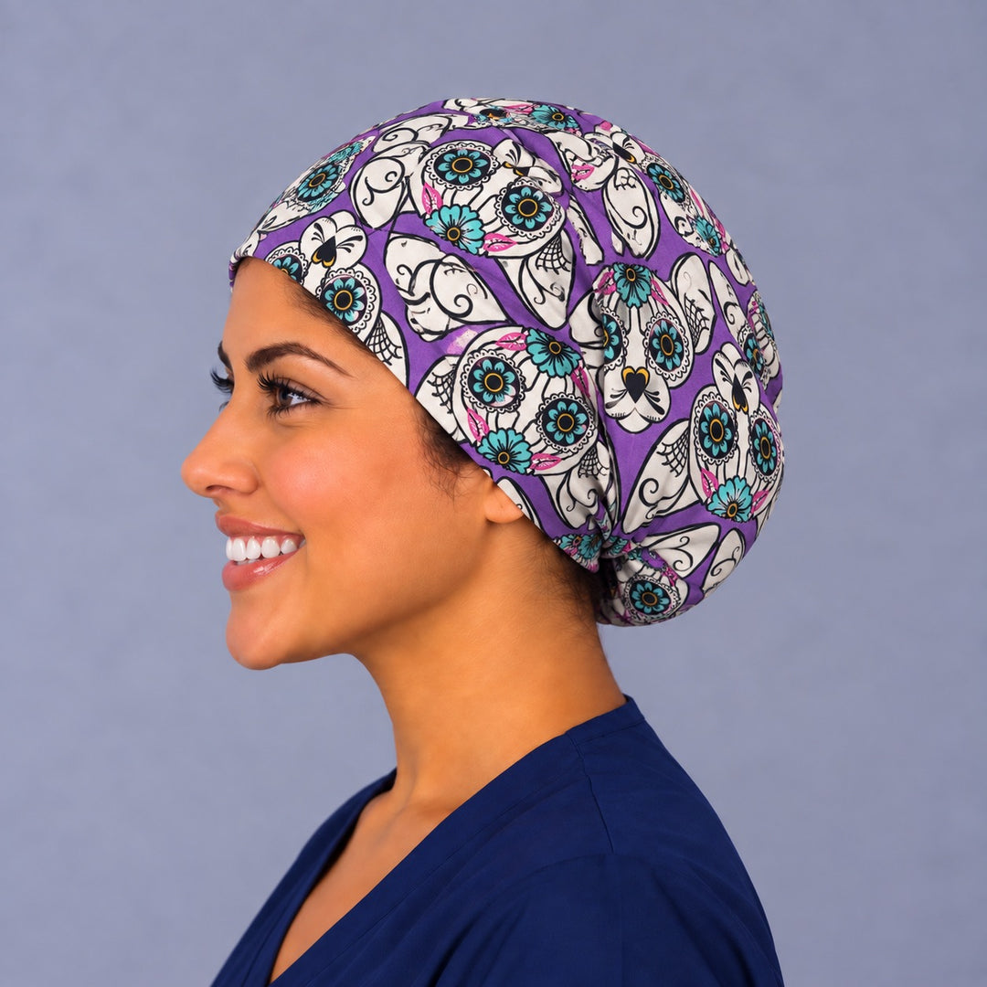 Left profile of the purple calavera cat surgical cap, fitted Euro crown for vet techs, surgical techs and cat lovers