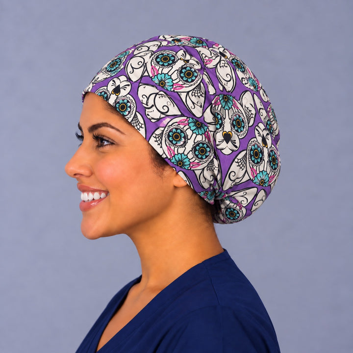 Left profile of the purple calavera cat surgical cap, fitted Euro crown for vet techs, surgical techs and cat lovers