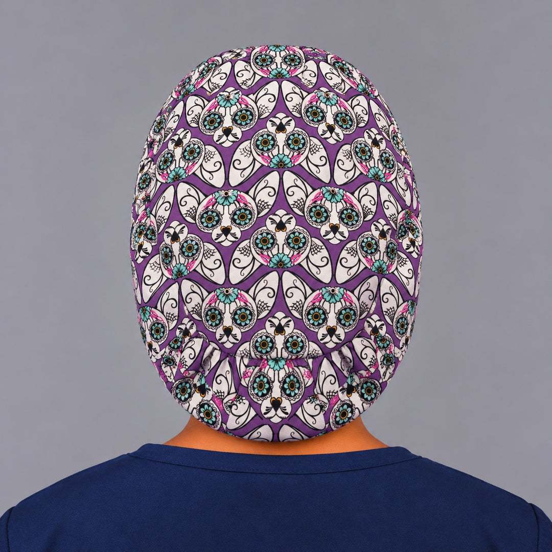 Back view of the purple cat Euro scrub cap showing the adjustable elastic back and full calavera cat print