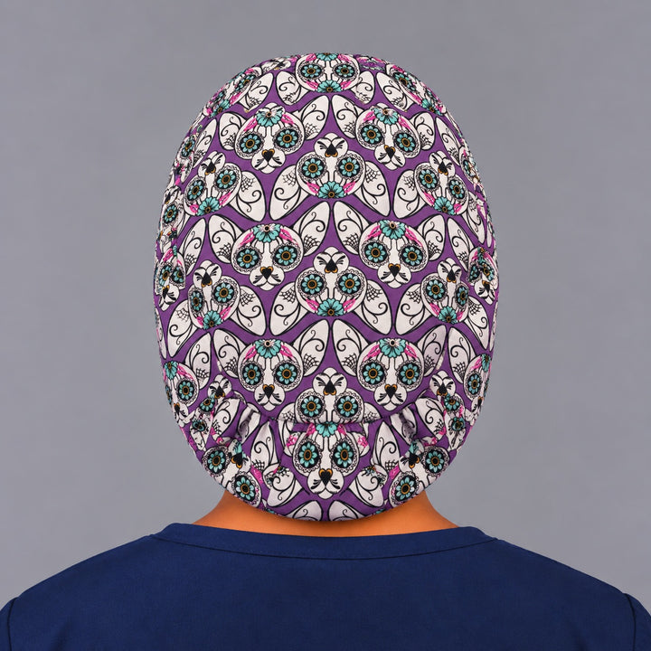 Back view of the purple cat Euro scrub cap showing the adjustable elastic back and full calavera cat print
