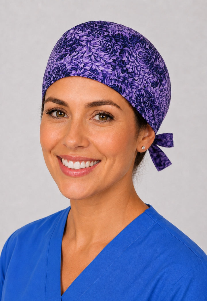 Purple floral euro scrub cap for women with short hair, handmade violet petal surgical hat, three-quarter view
