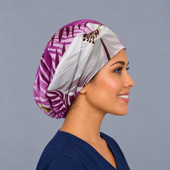 Right side profile of the purple palm leaf Euro surgical hat — burgundy berry and white frond print, breathable cotton cap for nurses
