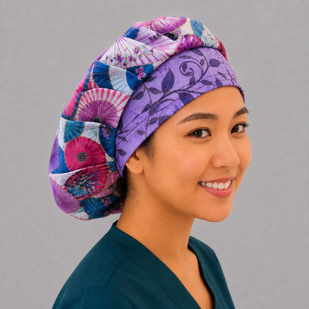 Purple parasol bouffant scrub cap, right angled smiling view — fuchsia and sapphire umbrella print for OR nurses and surgical techs