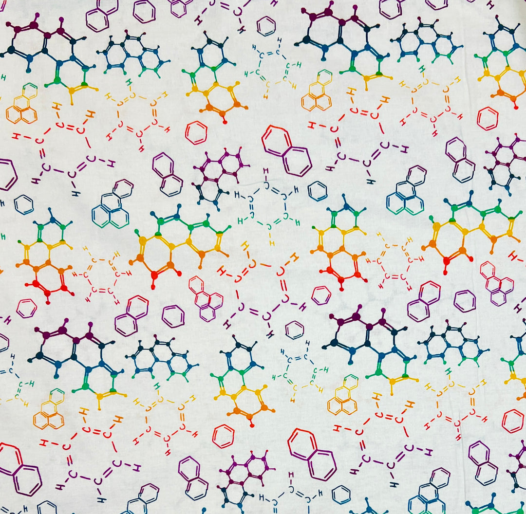 Close-up of the rainbow chemical structure cotton fabric, with hand-drawn C-H bonds, hexagon rings and ball-and-stick molecules on white