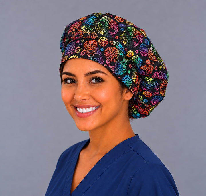 Rainbow filigree sugar skull bouffant scrub cap, left three-quarter view, black Mexican Día de los Muertos surgical hat for thick and curly hair