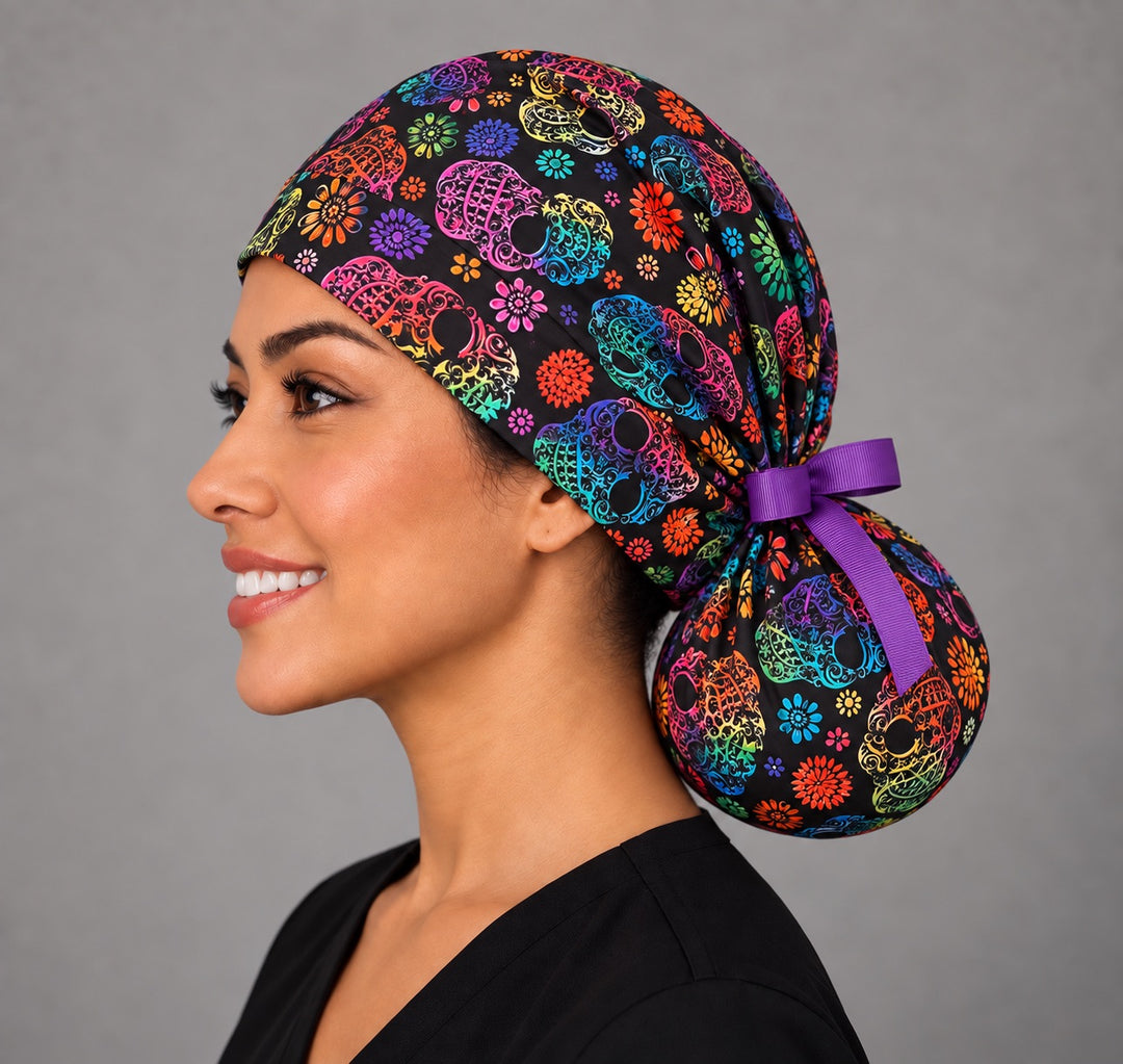 Left profile of the rainbow skull ponytail cap showing the roomy pouch for long, thick or curly hair