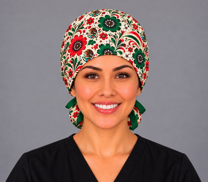 Nurse wearing a red, green and white Mexican ponytail surgical hat, front view, emerald and red flowers with the national eagle