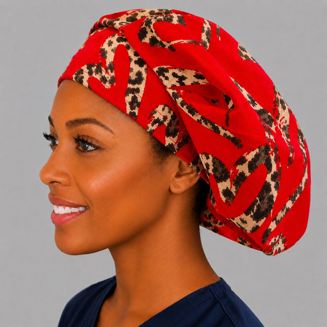 Red leopard Valentine bouffant scrub cap, left angled view — cheetah hearts print for OR nurses and surgical techs