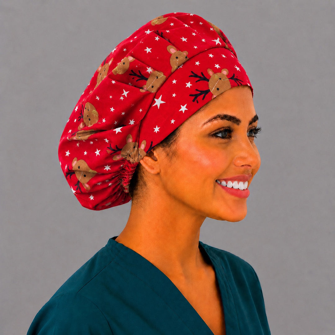 Side view of the red reindeer bouffant surgical hat — holiday star print with gold-nosed reindeer, roomy breathable cotton cap for nurses
